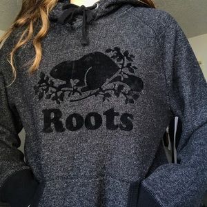 black roots sweater